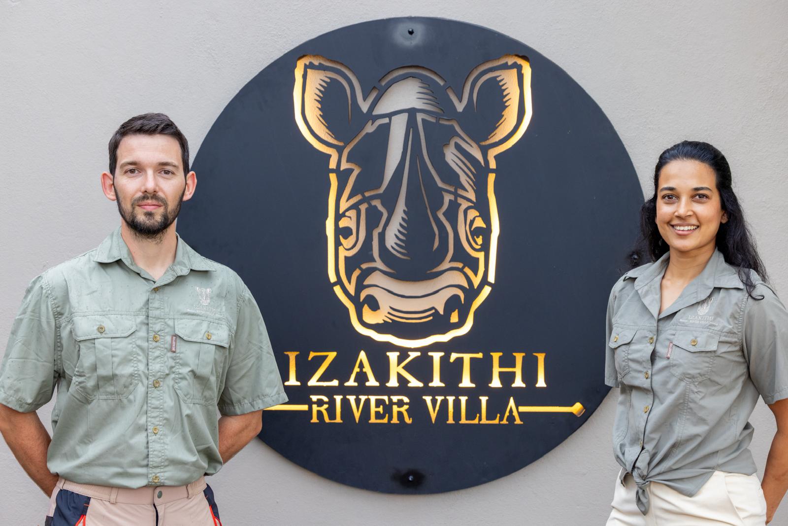 Izakithi founders Remi Vacher and Keshy G standing at the villa entrance